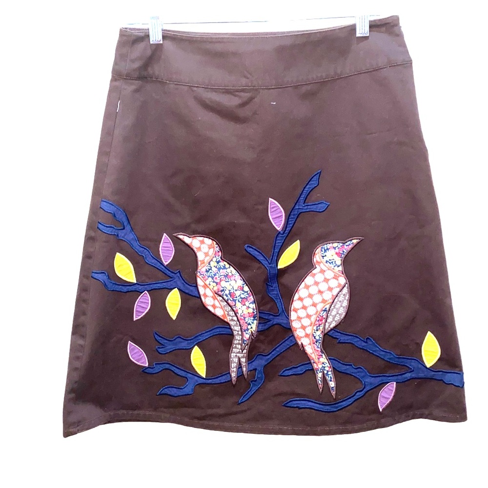 Boden flare skirt with bird patch embellishment